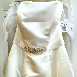 Wedding dress, Ivory, strapless,  Shell 100% Polyester, Lining 100% Polyester.